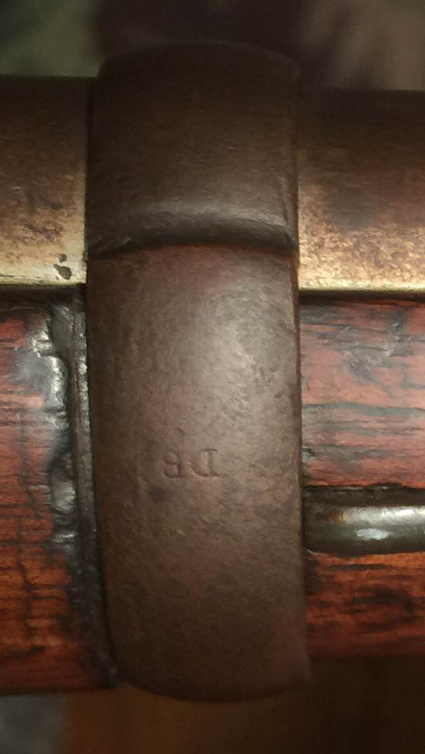 The rear barrel band stamped with the letters 'DB' up-side-down.