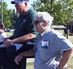 RSA Vice President Jack Heath looks on while other attendees busted the birds on the trap range.